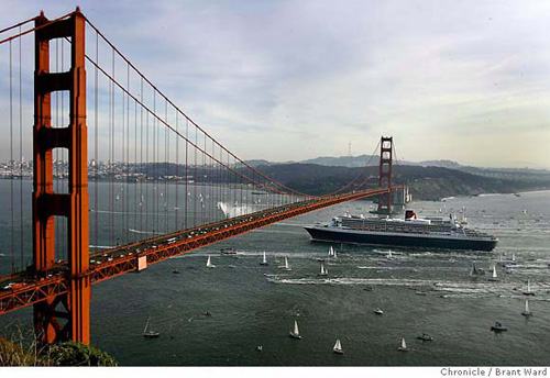 Queen Mary 2 Sails Beneath the Bridge